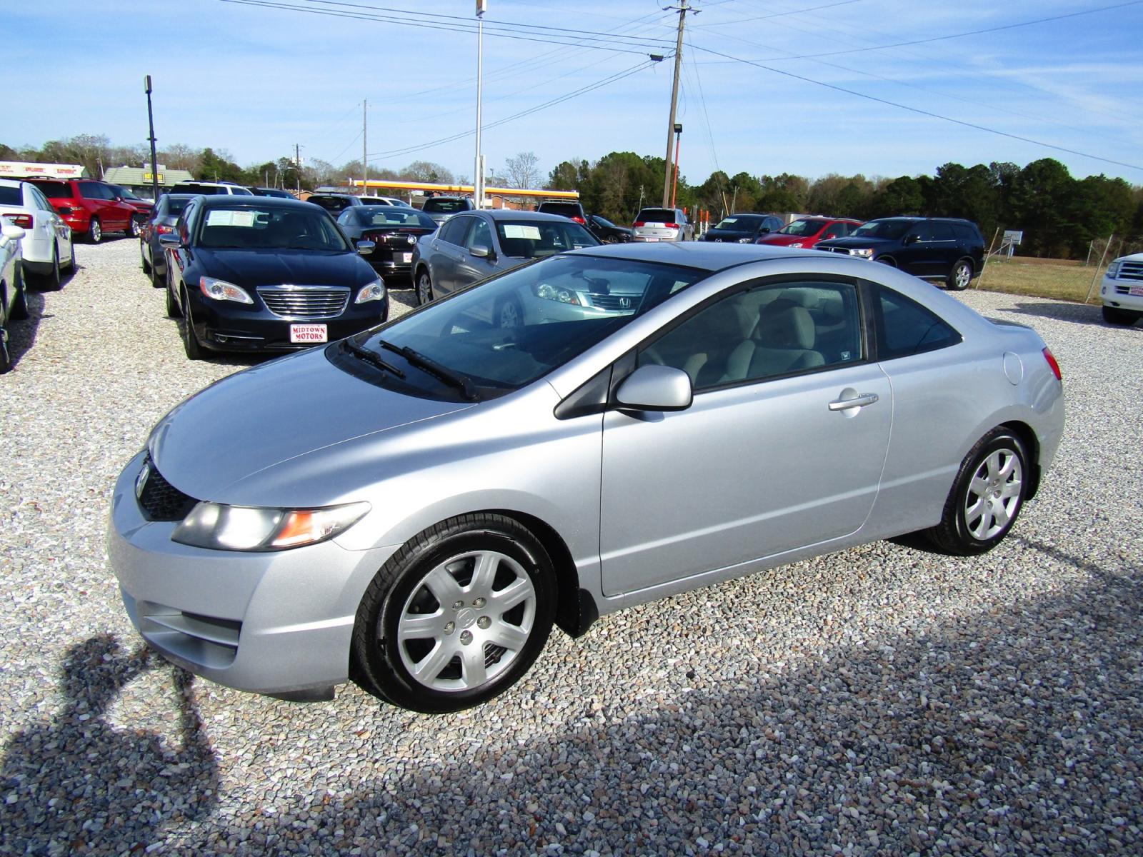 2011 Silver Honda Civic LX Coupe 5-Speed AT (2HGFG1B66BH) with an 1.8L L4 SOHC 16V engine, Automatic transmission, located at 15016 S Hwy 231, Midland City, AL, 36350, (334) 983-3001, 31.306210, -85.495277 - Photo #2